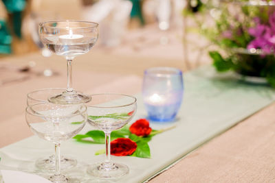 Close-up of wineglasses on table