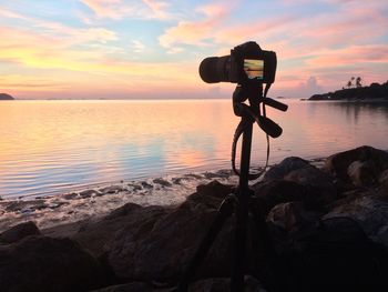 Scenic view of sea against sky during sunset