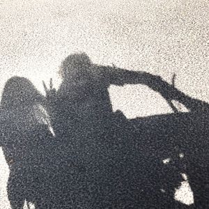 Shadow of people on sand