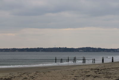 Scenic view of beach against sky