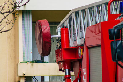 Low angle view of red lanterns hanging on building