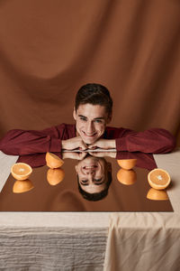 Portrait of man holding ice cream