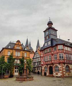 View of buildings in city against sky