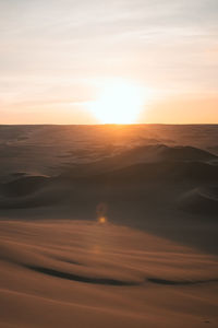 Scenic view of landscape against sky during sunset