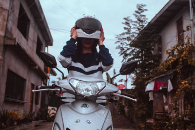 Rear view of man standing on street