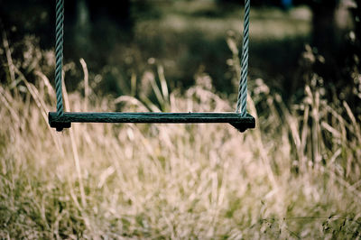 Close-up of swing in playground