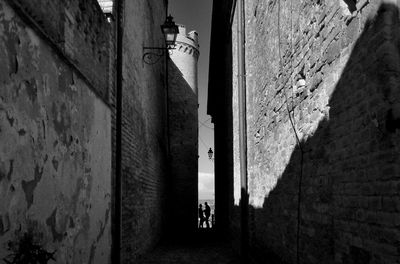 Narrow alley amidst old buildings