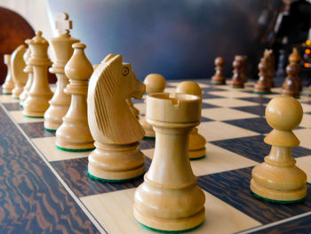 Close-up of chess pieceson board