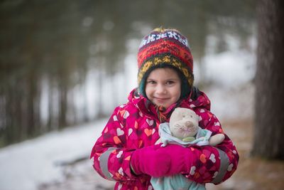 Portrait of smiling girl during winter