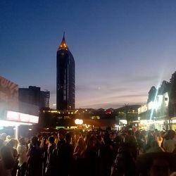 People in city at night