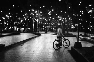 Blurred motion of people on road at night