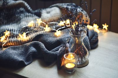 Close-up of candles on table