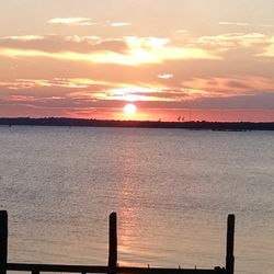 Scenic view of sunset over sea