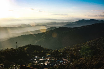 Scenic view of mountains against sky during sunset