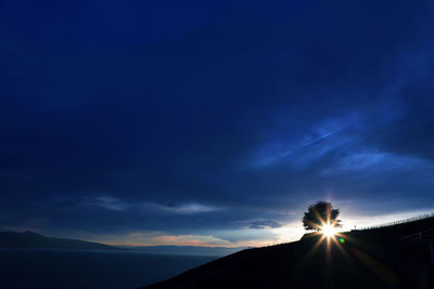 Silhouette mountain against sky during sunset