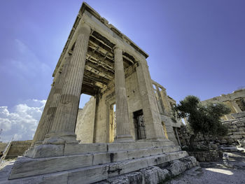 Low angle view of old ruins against clear sky