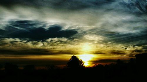 Scenic view of dramatic sky during sunset