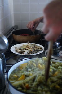 Man preparing food in kitchen