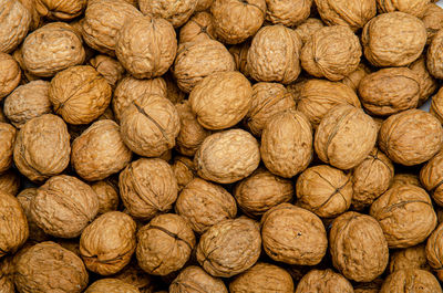 A bunch of brown walnuts