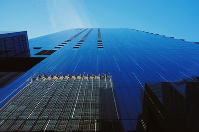 Low angle view of road against blue sky