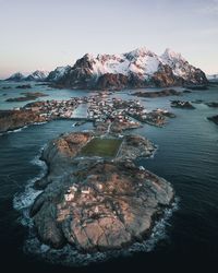 Scenic view of sea against clear sky during sunset