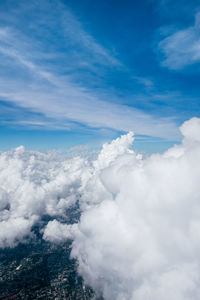Aerial view of clouds against blue sky