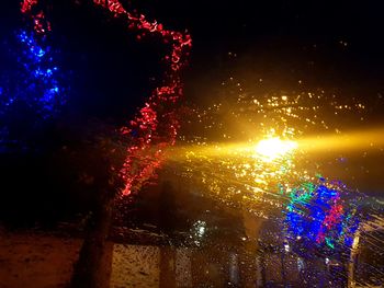 Close-up of illuminated firework display at night