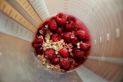 High angle view of raspberries on table