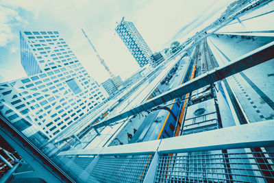 Low angle view of modern buildings against sky