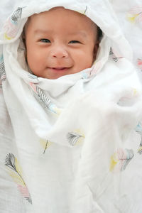 Portrait of cute baby lying down