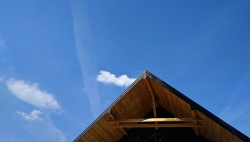 Low angle view of building against blue sky