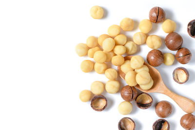 High angle view of candies against white background