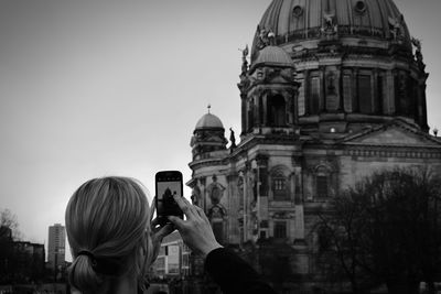 Woman photographing through camera