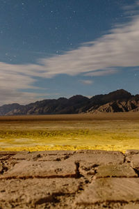 Distant view of mountains in desert against sky