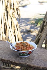 Indonesian food, mie ayam or bakmi ayam, noodles with shredded chicken. 