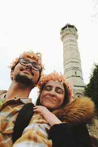 Self portrait of young tourist couple in front of historic mosque adana turkey