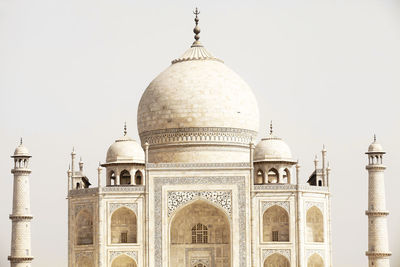 Low angle view of taj mahal against clear sky on sunny day