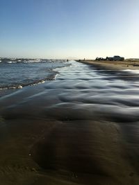 Scenic view of sea against clear sky