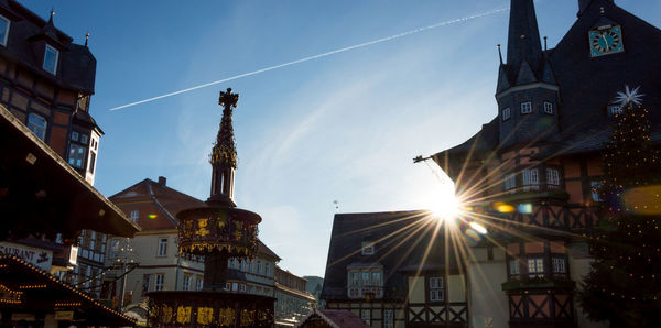 Low angle view of buildings in city against sky