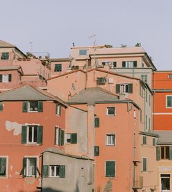 Residential buildings against clear sky