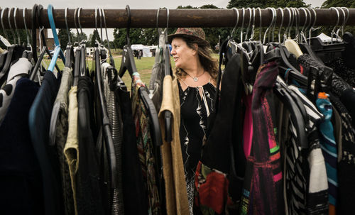 Woman standing in rack