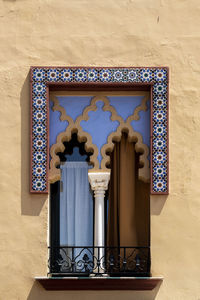 Low angle view of ornate door on building