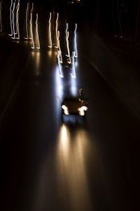 People walking on street at night