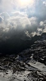 Aerial view of landscape against sky during winter