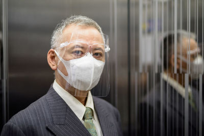 Portrait of man wearing mask