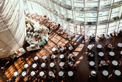 High angle view of people standing on floor