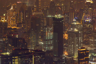 Illuminated buildings in city at night