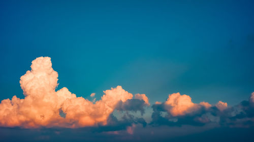 Low angle view of clouds in sky during sunset