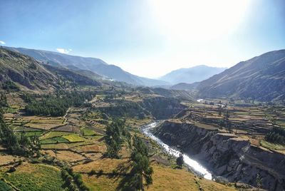 High angle view of landscape and mountains against sky