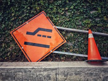 Traffic cone on retaining wall